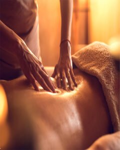 Professional therapist performing a relaxing Back Massage to release stress, ease muscle discomfort, and improve flexibility.