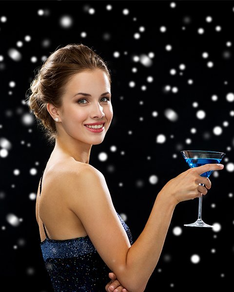 Woman with glamorous, event-ready Party Makeup for a cocktail or evening party, featuring bold eyes and glowing skin.
