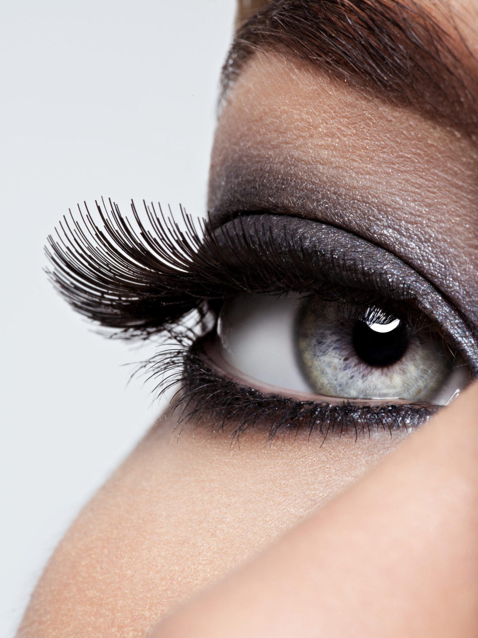 Close-up of an eye with long, voluminous Eyelash Extensions for a fuller, more dramatic, yet natural-looking finish.
